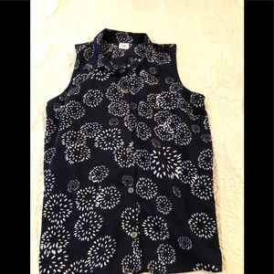 A blue and white CAbi blouse